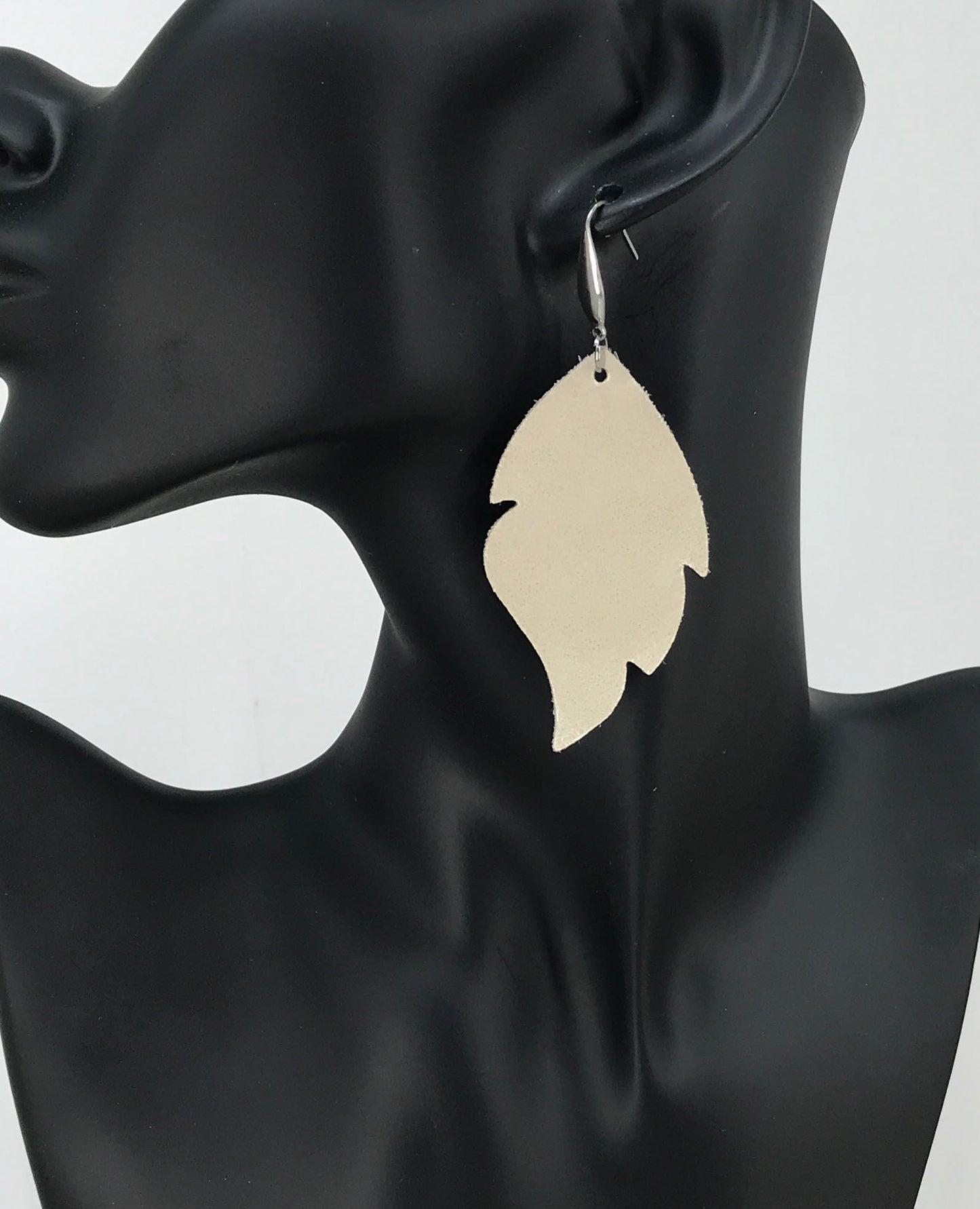 Champagne Pearlized Curved Leaf Leather Earrings