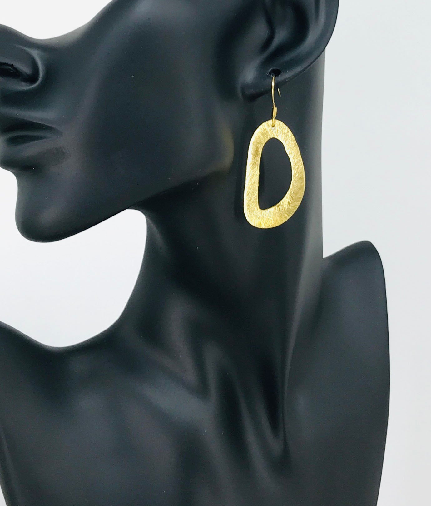 Golden Drift Oval Drop Earrings